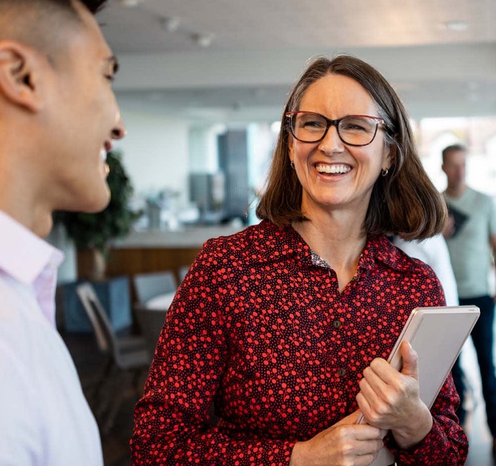 Man and woman talking about Executive Search with Magnetic Recruitment